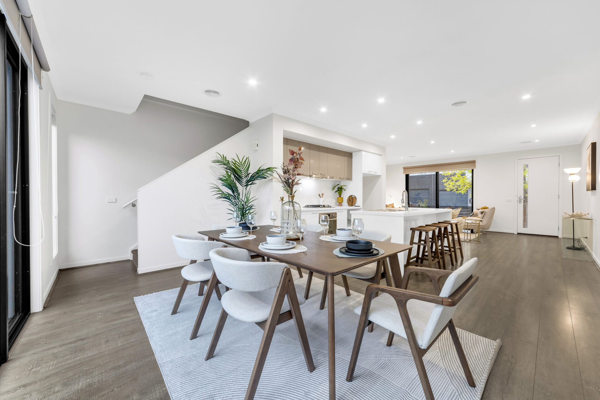 Modern display kitchen and living space staged for developers