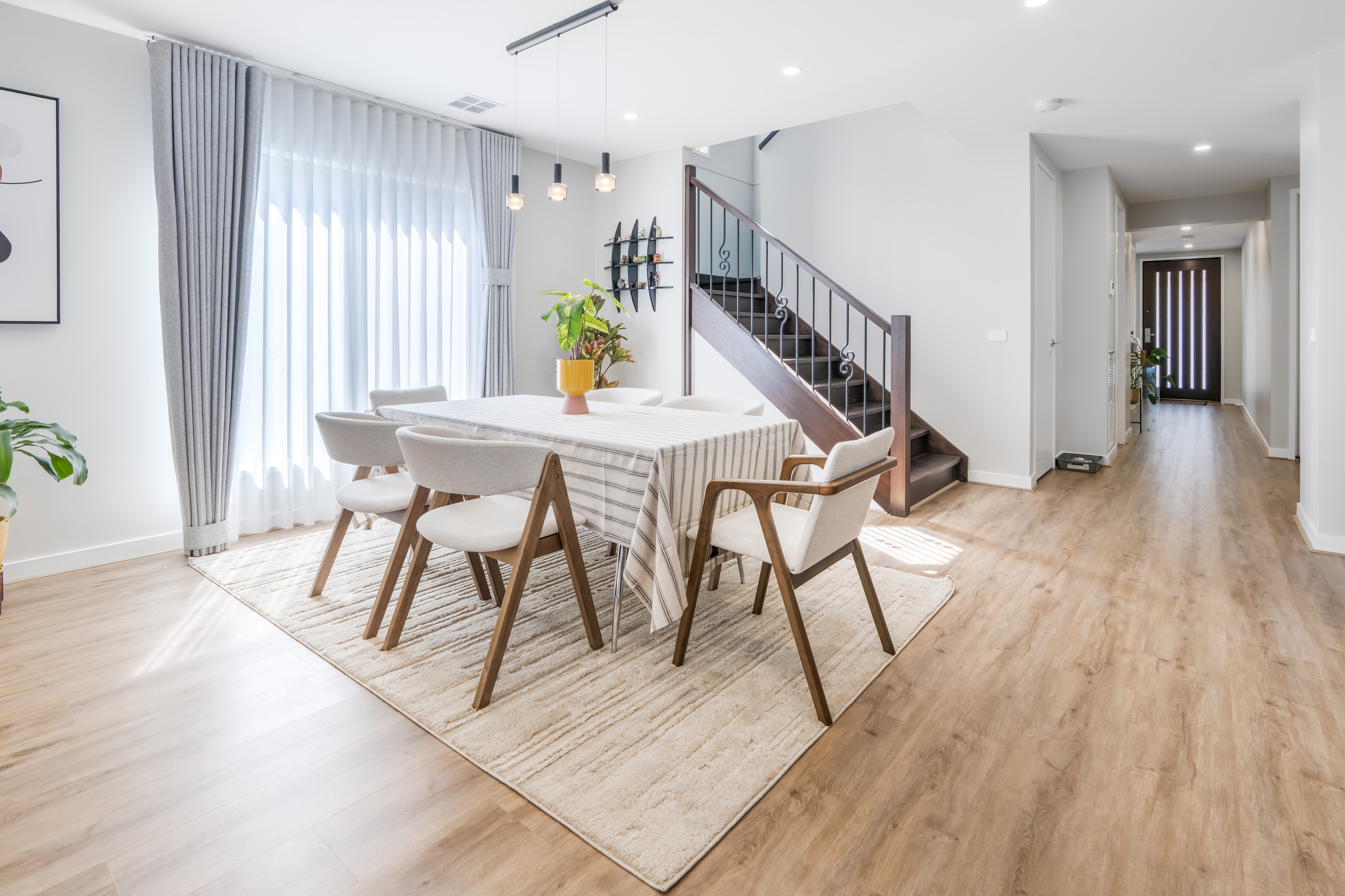 Modern display kitchen and living space staged for developers